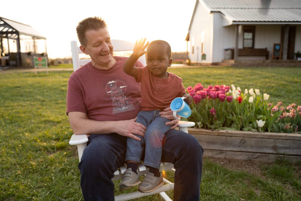 father and son on tulip farm